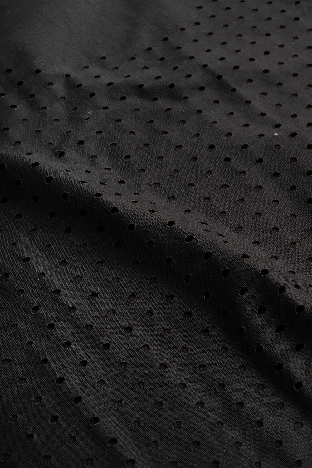 LASER CUT TANK TOP IN BLACK