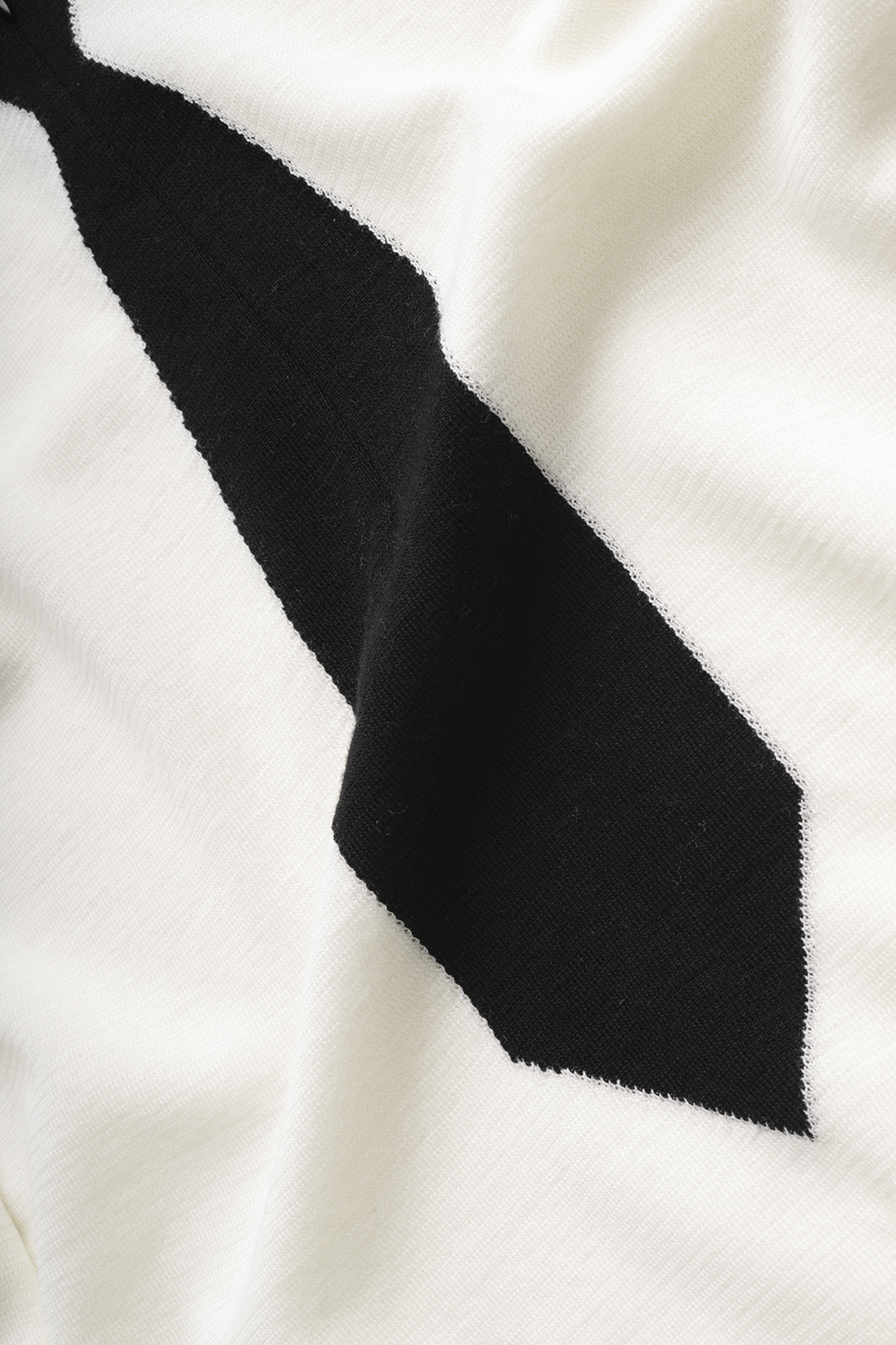 KNITTED TIE SHIRT IN WHITE