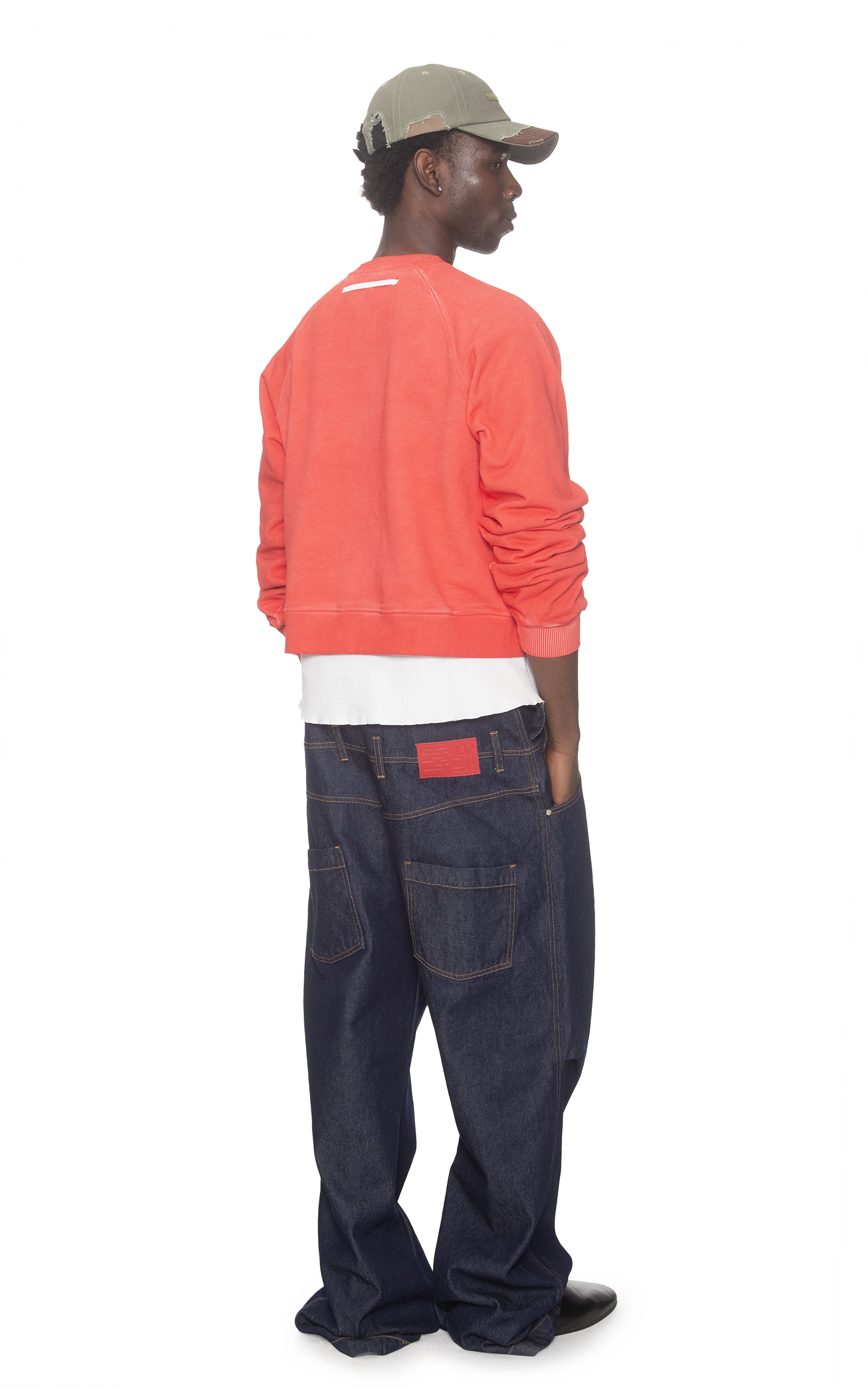 ASYMMETRICAL RAGLAN SWEATER IN RED