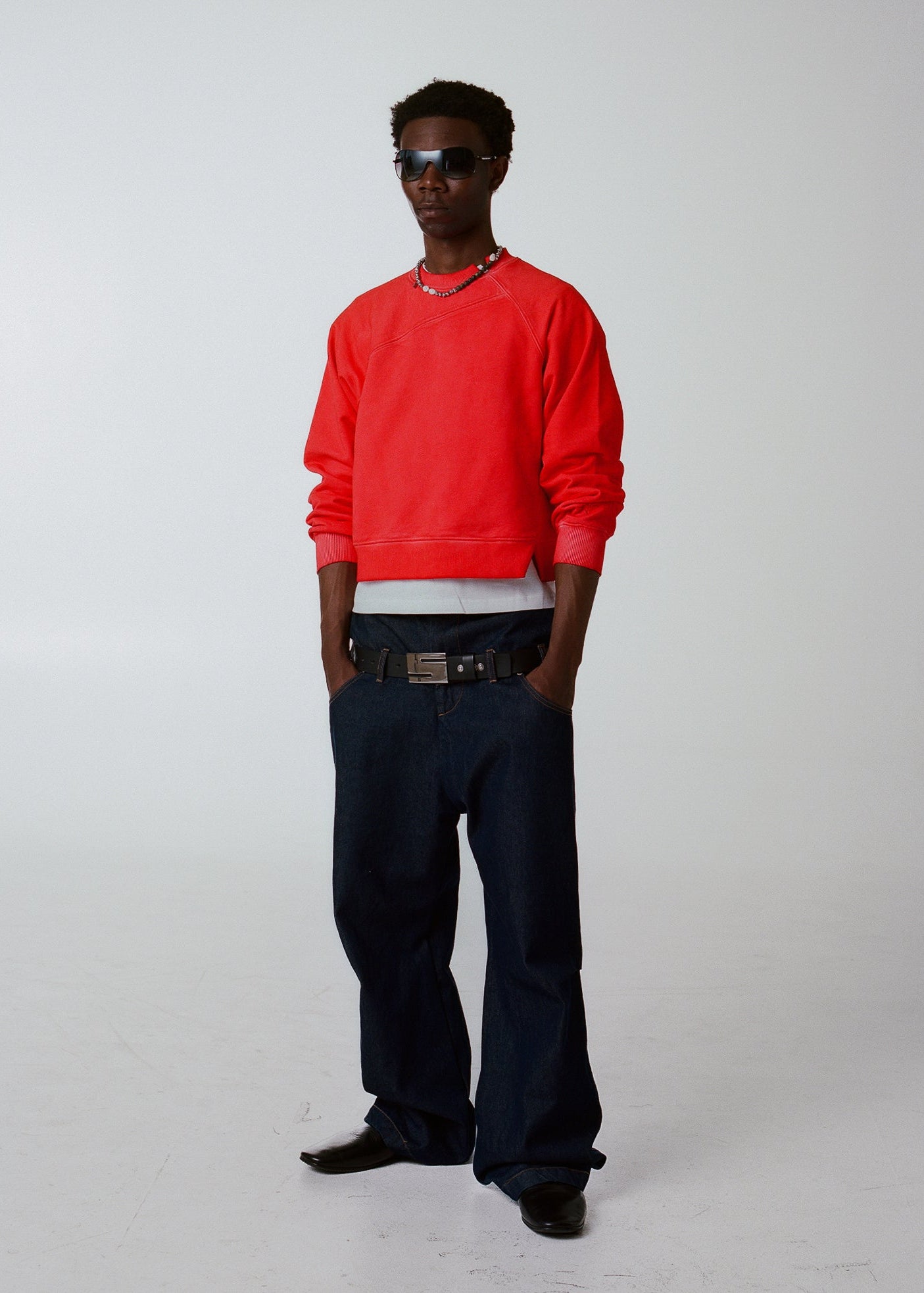 ASYMMETRICAL RAGLAN SWEATER IN RED