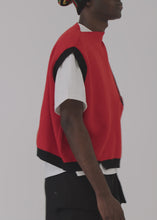Load and play video in Gallery viewer, RED/BLACK ASYMETRICAL KNIT VEST
